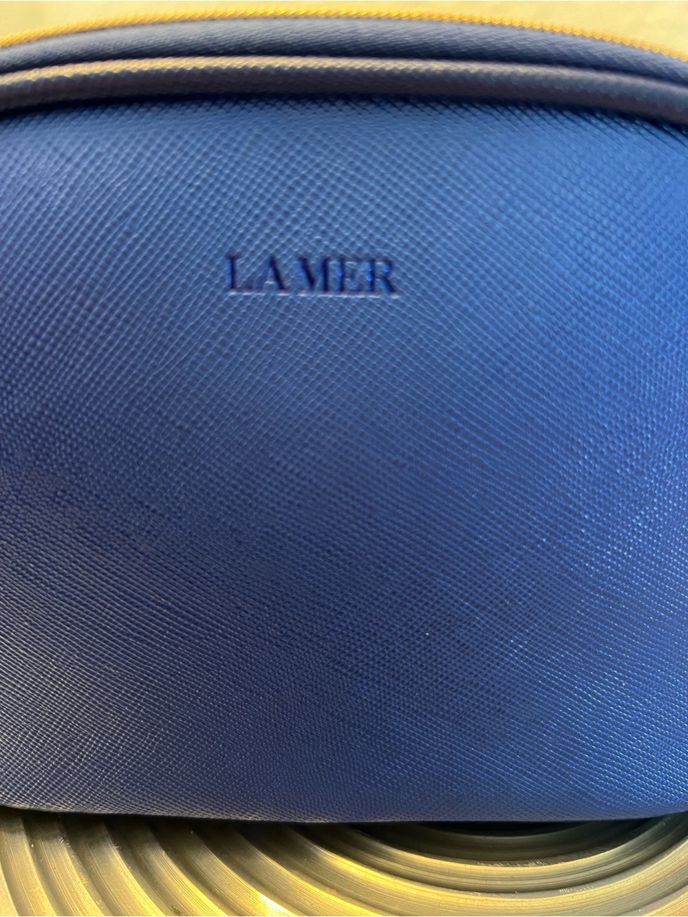 Woman’s LAMER Blue Leather Travel Pouch